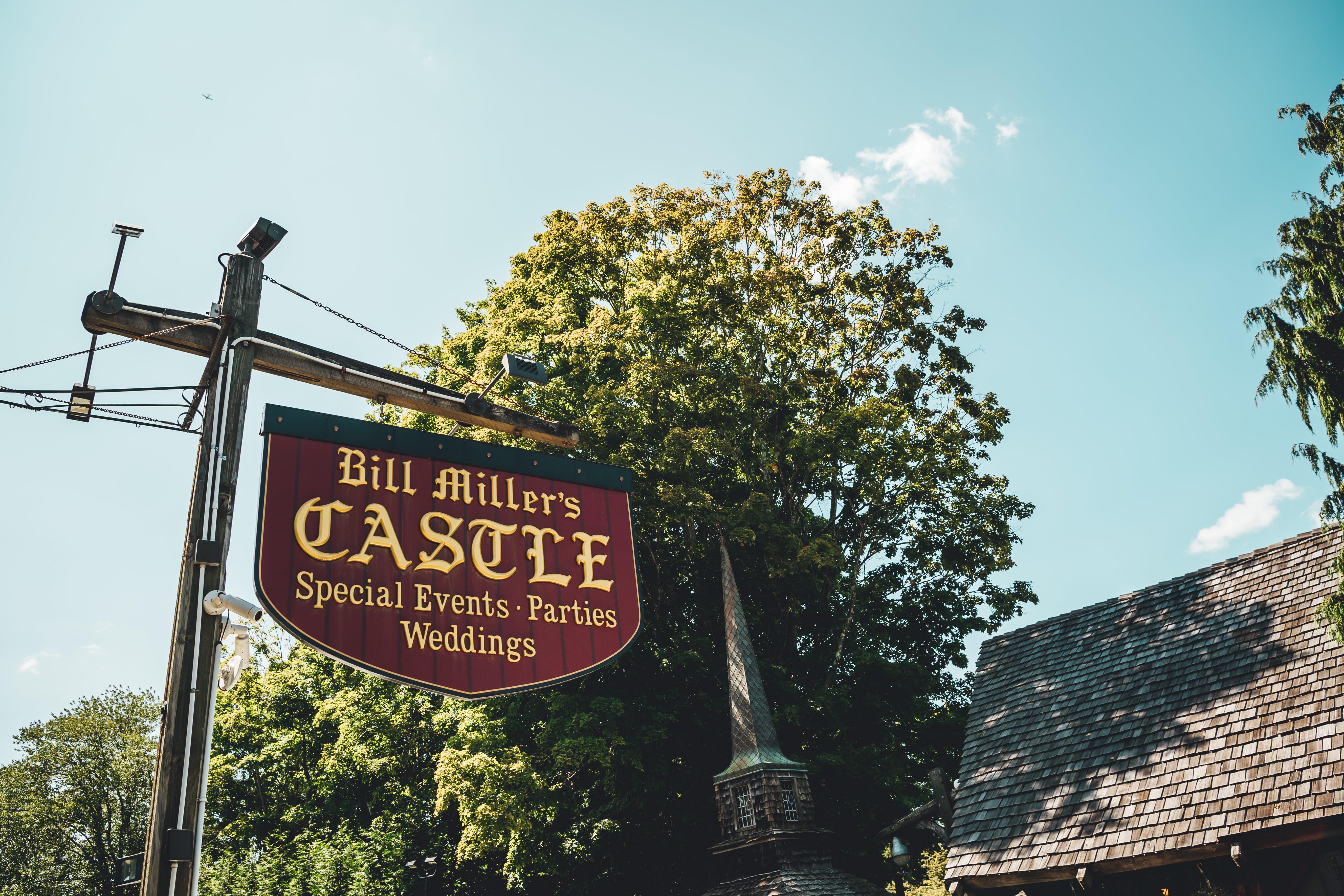 The hanging Bill Miller's Castle sign at a real wedding