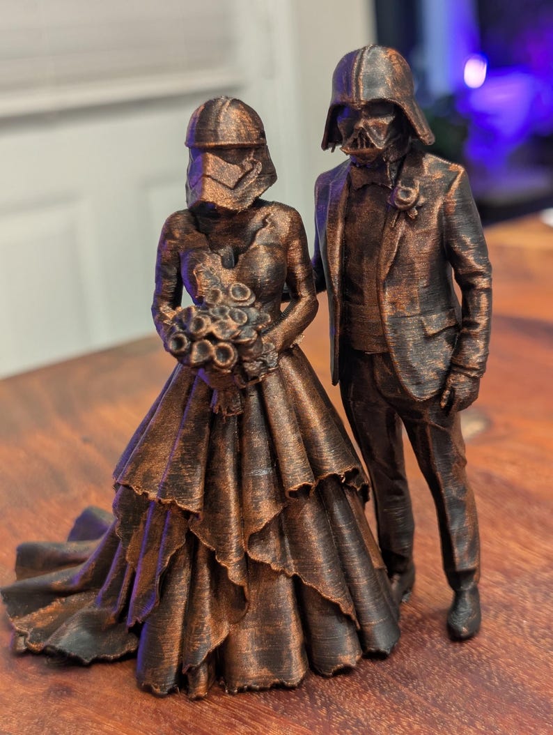Darth Vader groom and Captain Phasma bride wedding cake topper figurine